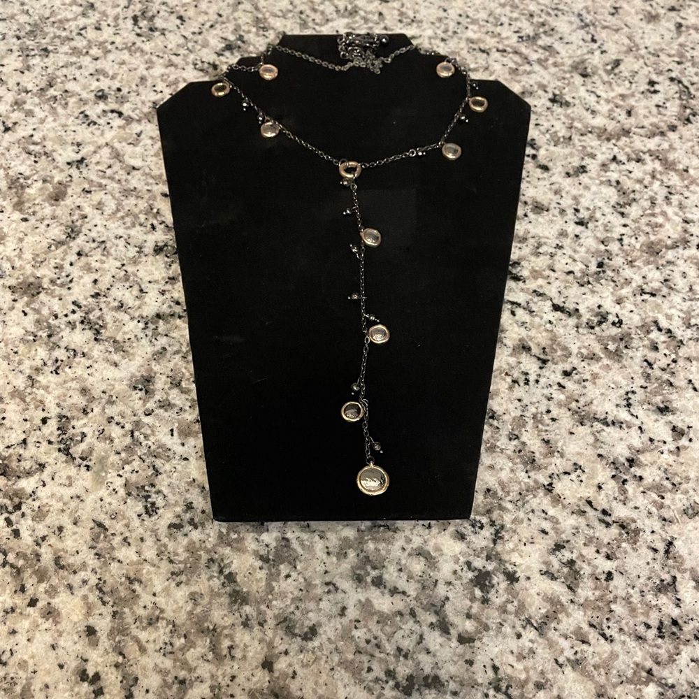Chico’s vintage black, silvertone and goldtone necklace.